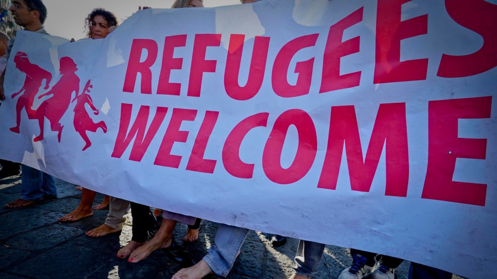 Köszöntik a menekülteket- Fotó: EPA