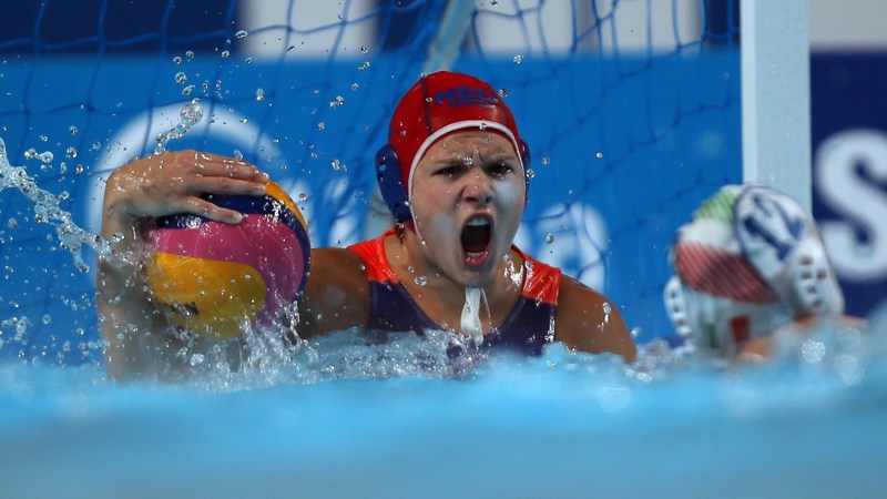 2015-08-05 18:27:45 Laura Aarts of Netherlands holds the ball during the women's water polo semi-final match Italy vs Netherlands at the 16th FINA World Championships on August 5, 2015 in Kazan, Russia. AFP PHOTO / ROMAN KRUCHININ